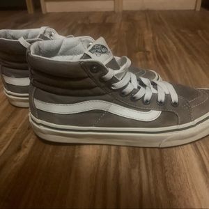 Women’s hightop Vans.